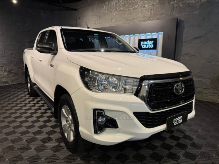 TOYOTA - HILUX - 2019/2019 - Branca - R$ 180.900,00